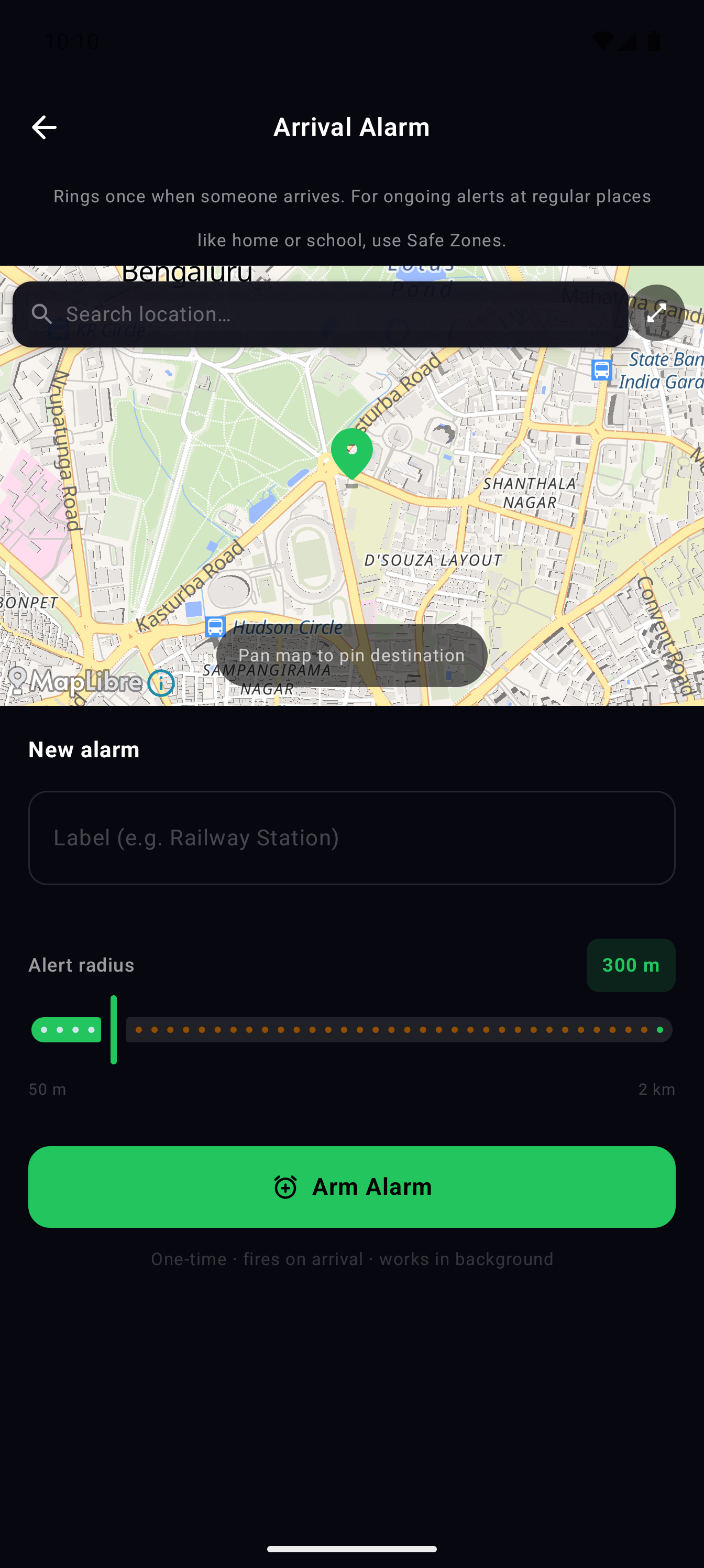 Raksha Arrival Alarm setup screen with map pin, label, and radius slider